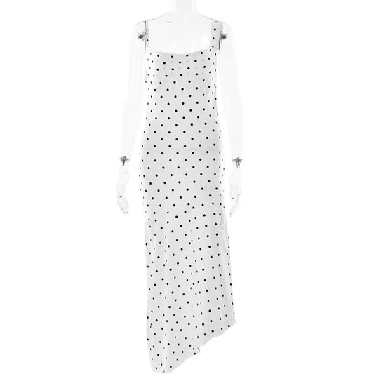 White dress with black polka dots on a white background