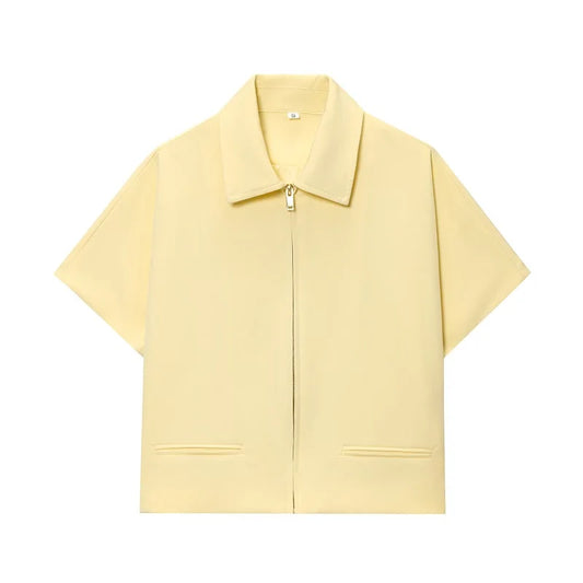 Yellow short-sleeve shirt with a collar on a white background