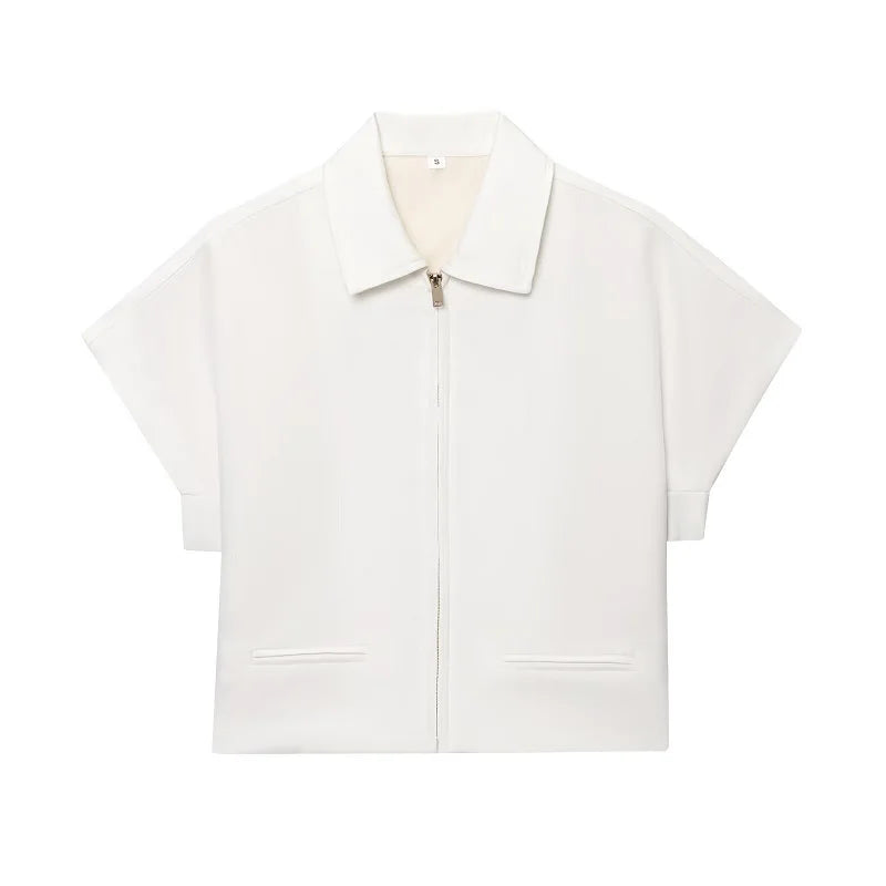 White zip-up shirt with short sleeves on a white background