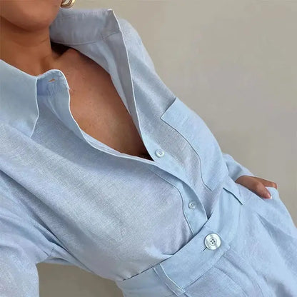 Light blue shirt worn by a person with a neutral background