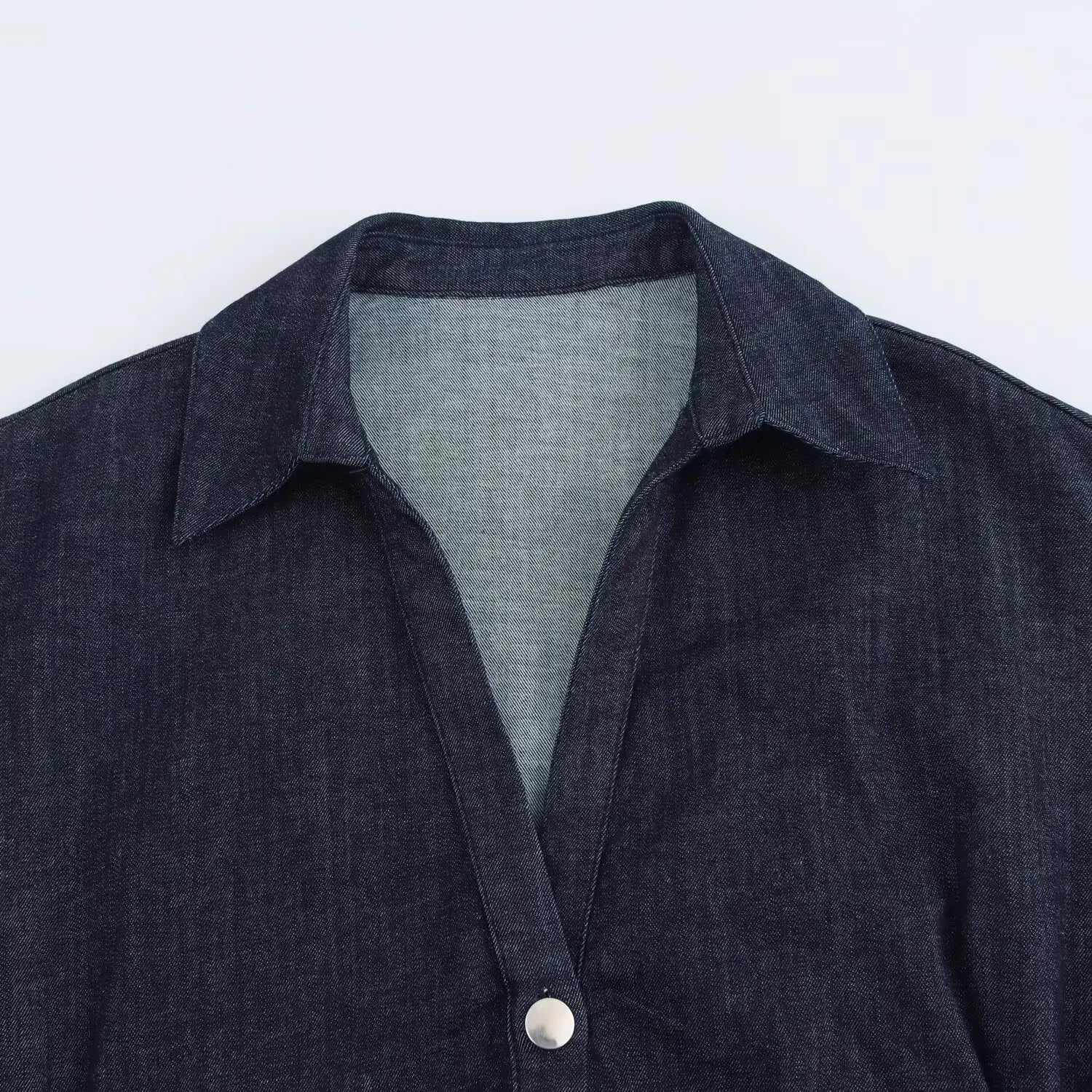 Dark denim shirt/dress on a white background