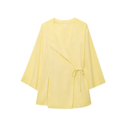 Yellow kimono-style garment on a white background
