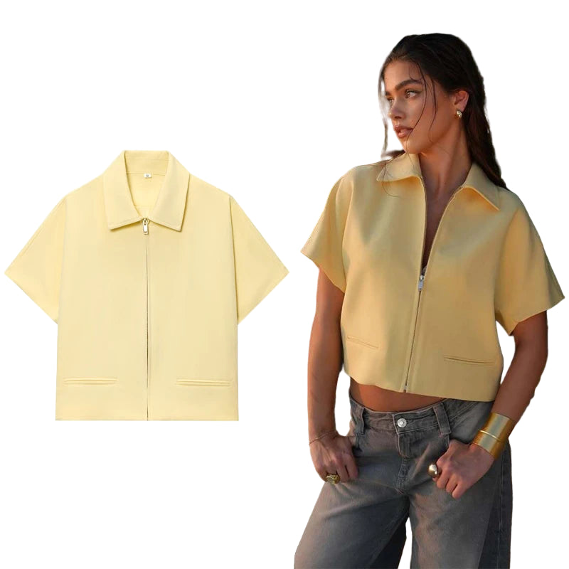Yellow short-sleeve jacket with a model wearing it outdoors.