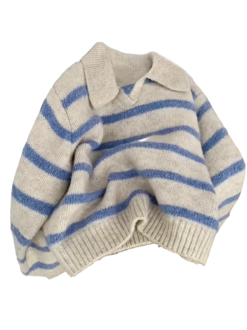 Beige and blue striped sweater on a white background