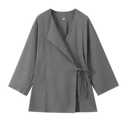 Gray coat with a tie waist on a white background
